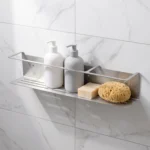 Paslanmaz banyo rafı 64 cm, mermer duvarda dolu raf